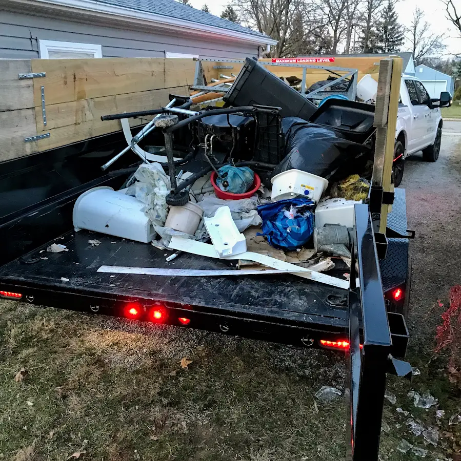 Roll-off dumpster delivered to a residential driveway in Moses Lake